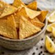 AI-generated illustration of tortilla chips with lemon and black pepper