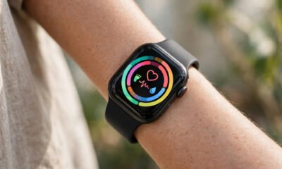 Smartwatch on a wrist showing health stats