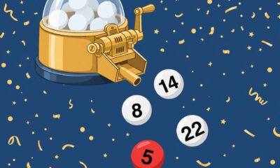 Lottery balls coming out of a lottery machine